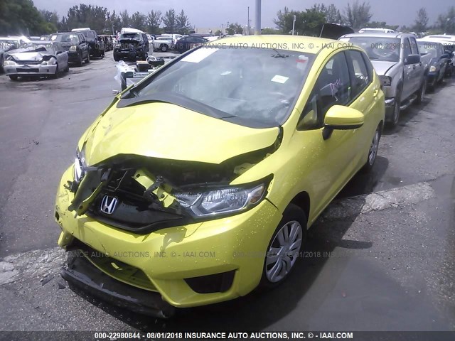 JHMGK5H51GX009781 - 2016 HONDA FIT LX YELLOW photo 2