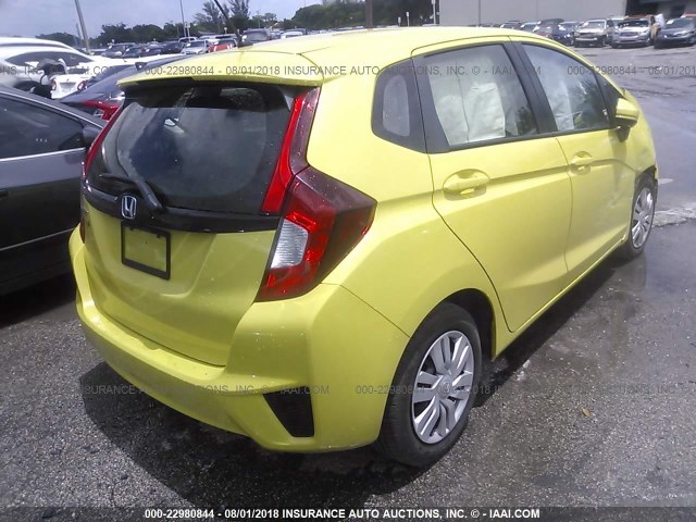 JHMGK5H51GX009781 - 2016 HONDA FIT LX YELLOW photo 4