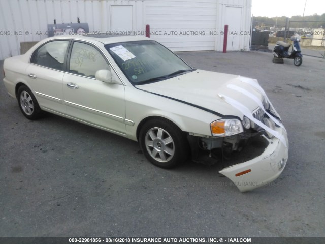 KNAGD128535235459 - 2003 KIA OPTIMA LX/SE TAN photo 1