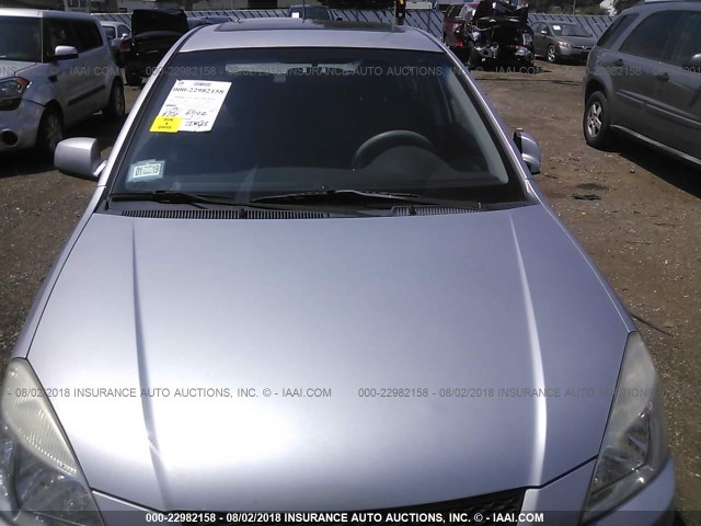 KNADE163566078111 - 2006 KIA RIO 5 Argent photo 6