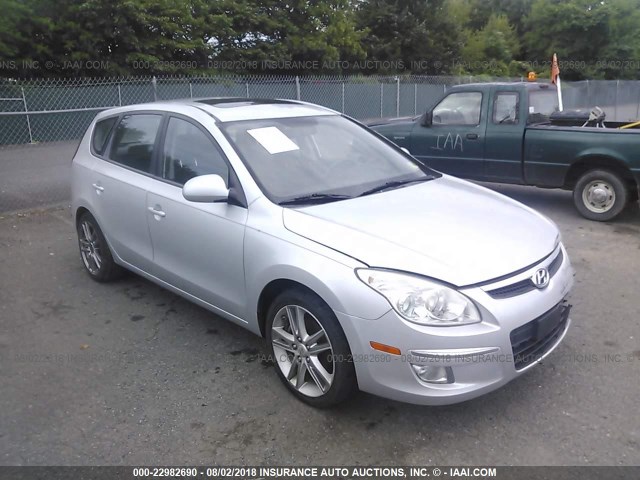 KMHDC86EX9U033177 - 2009 HYUNDAI ELANTRA TOURING  SILVER photo 1