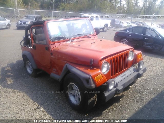 1J4FA49S35P303866 - 2005 JEEP WRANGLER / TJ SPORT ORANGE photo 1