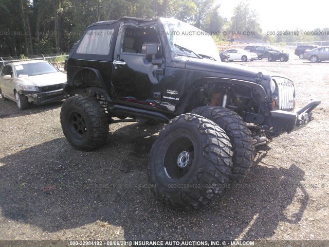 1J4FA541X9L749370 - 2009 JEEP WRANGLER SAHARA BLACK photo 1