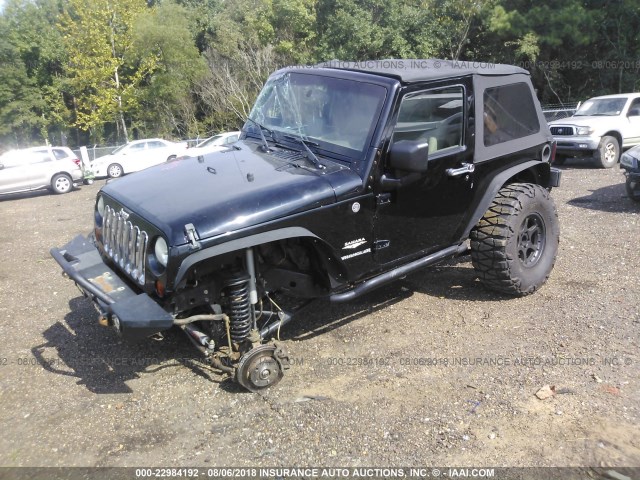 1J4FA541X9L749370 - 2009 JEEP WRANGLER SAHARA BLACK photo 2