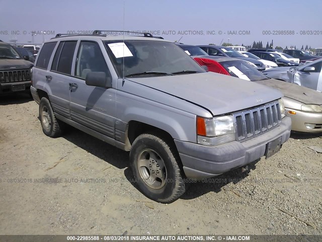 1J4GZ58S8VC617203 - 1997 JEEP GRAND CHEROKEE LAREDO/TSI SILVER photo 1