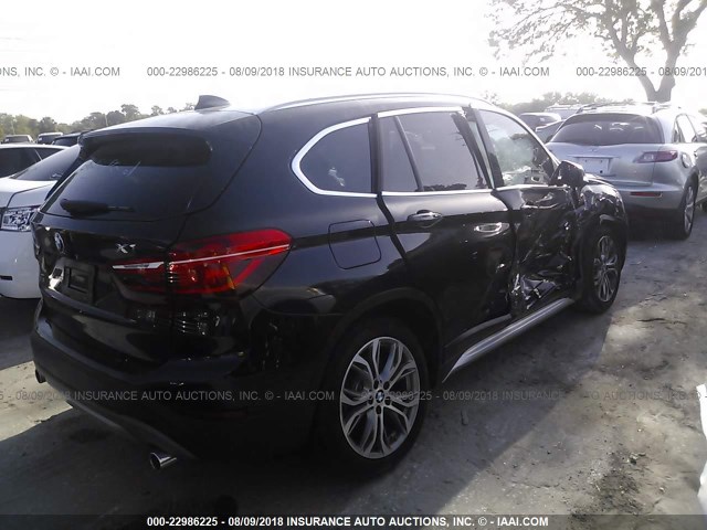 WBXHU7C38HP924942 - 2017 BMW X1 SDRIVE28I BLACK photo 4
