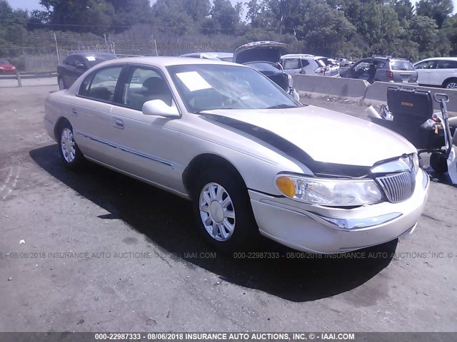 1LNHM97V4YY892727 - 2000 LINCOLN CONTINENTAL  TAN photo 1