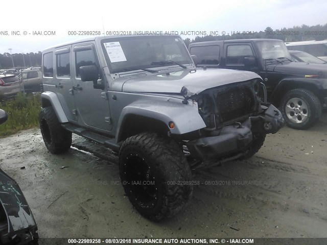 1C4HJWEG9DL594410 - 2013 JEEP WRANGLER UNLIMITE SAHARA SILVER photo 1