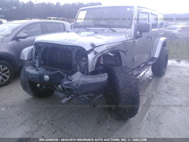 1C4HJWEG9DL594410 - 2013 JEEP WRANGLER UNLIMITE SAHARA SILVER photo 6