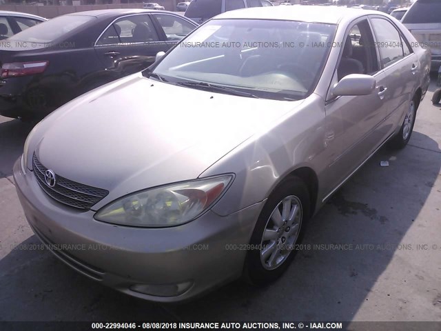JTDBE30K930176773 - 2003 TOYOTA CAMRY LE/XLE GOLD photo 2