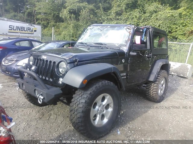 1C4AJWAG0FL565761 - 2015 JEEP WRANGLER SPORT BLACK photo 2