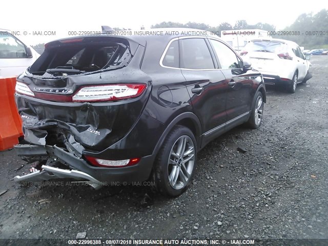 5LMCJ2A92FUJ18774 - 2015 LINCOLN MKC BLACK photo 4