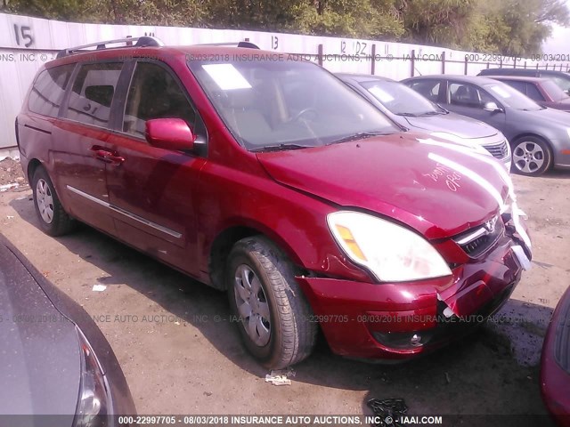 KNDMC233876023995 - 2007 HYUNDAI ENTOURAGE GLS/SE/LIMITED RED photo 1