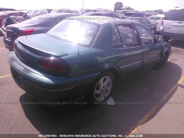 1G2NE52MXVC861863 - 1997 PONTIAC GRAND AM SE GREEN photo 4