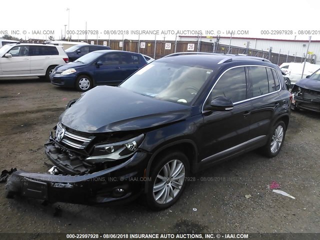 WVGBV7AX0DW519854 - 2013 VOLKSWAGEN TIGUAN BLACK photo 2