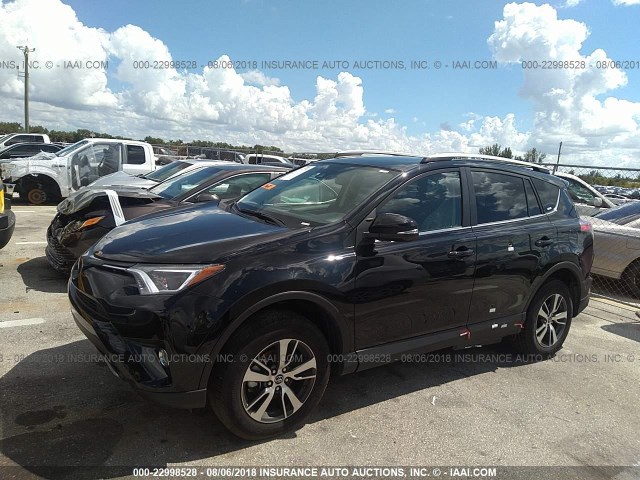 2T3WFREV7JW422846 - 2018 TOYOTA RAV4 ADVENTURE/XLE BLACK photo 6