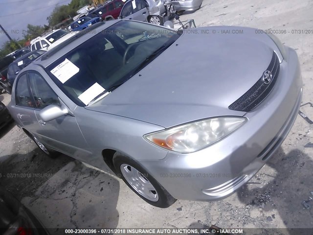 4T1BE32K43U771399 - 2003 TOYOTA CAMRY LE/XLE/SE SILVER photo 1