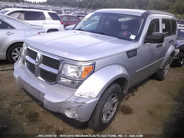 1D4PU2GKXBW535703 - 2011 DODGE NITRO SILVER photo 2