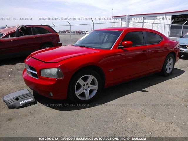 2B3KA53T89H557323 - 2009 DODGE CHARGER R/T RED photo 2