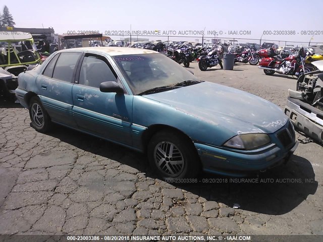 1G2NE54N8NC262627 - 1992 PONTIAC GRAND AM SE BLUE photo 1