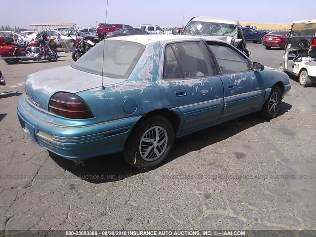 1G2NE54N8NC262627 - 1992 PONTIAC GRAND AM SE BLUE photo 4