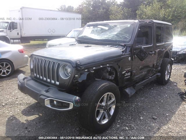 1C4HJXEG0JW101343 - 2018 JEEP WRANGLER UNLIMITE SAHARA GRAY photo 2