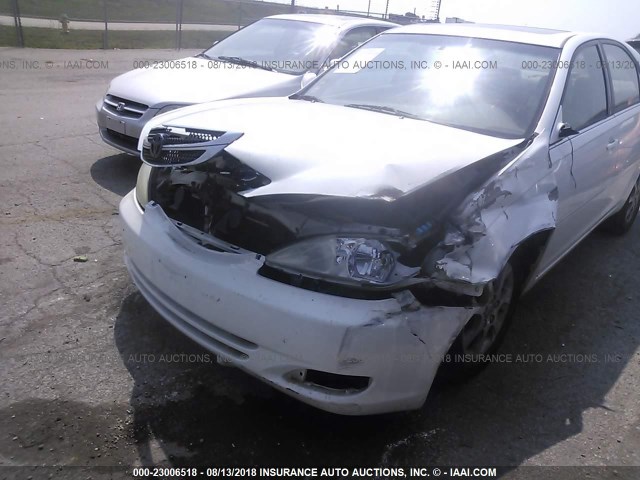 JTDBE32K140257426 - 2004 TOYOTA CAMRY LE/XLE WHITE photo 6