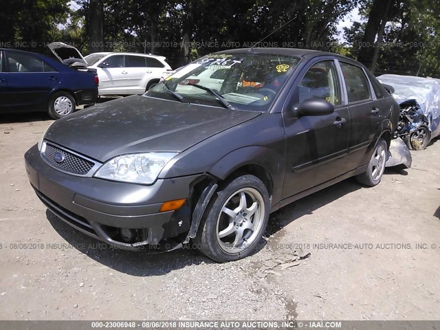 1FAHP34NX7W342655 - 2007 FORD FOCUS ZX4/S/SE/SES GRAY photo 2