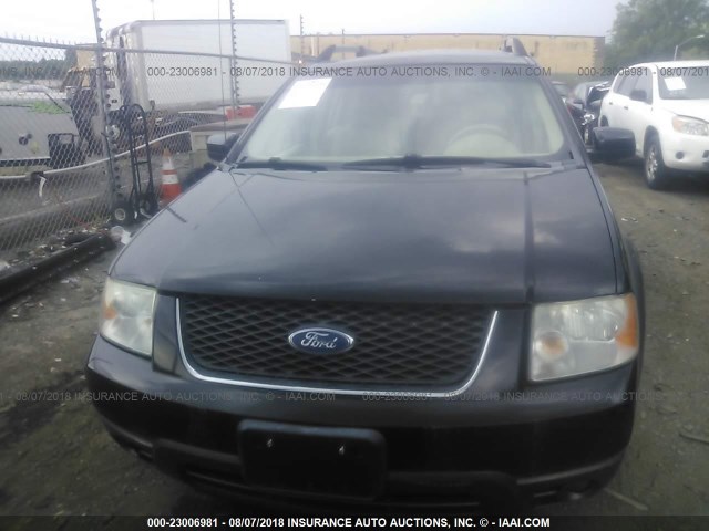 1FMDK02107GA31747 - 2007 FORD FREESTYLE SEL BLACK photo 6