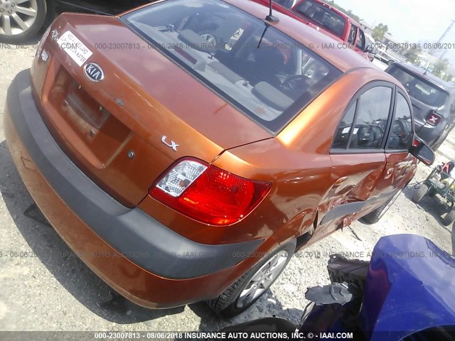 KNADE223096516503 - 2009 KIA RIO LX/SX ORANGE photo 4