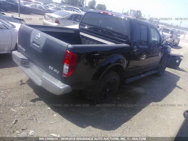 1N6AD07W99C403499 - 2009 NISSAN FRONTIER CREW CAB SE/LE/NISMO BLACK photo 4