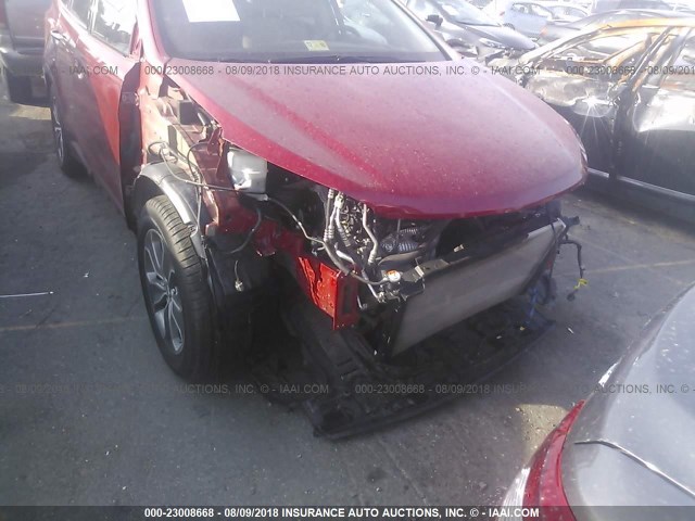 KM8SM4HF6GU159472 - 2016 HYUNDAI SANTA FE SE RED photo 6