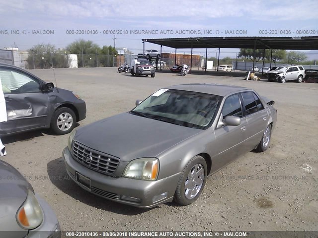 1G6KF57972U153546 - 2002 CADILLAC DEVILLE DTS RED photo 2