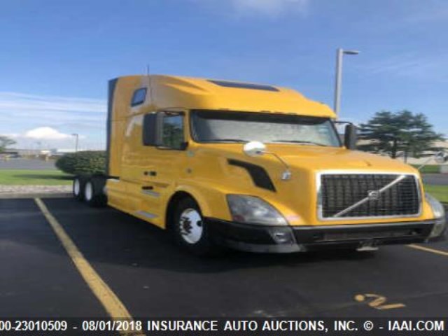 4V4NC9EJ2CN539573 - 2012 VOLVO VN YELLOW photo 1