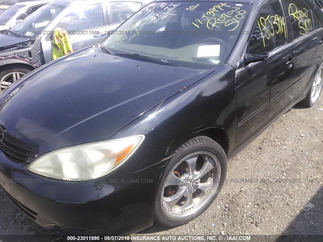 4T1BE32K42U010659 - 2002 TOYOTA CAMRY LE/XLE/SE Qara foto 6