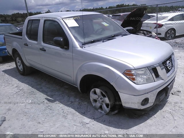 1N6AD07U39C418739 - 2009 NISSAN FRONTIER CREW CAB SE/LE/NISMO SILVER photo 1