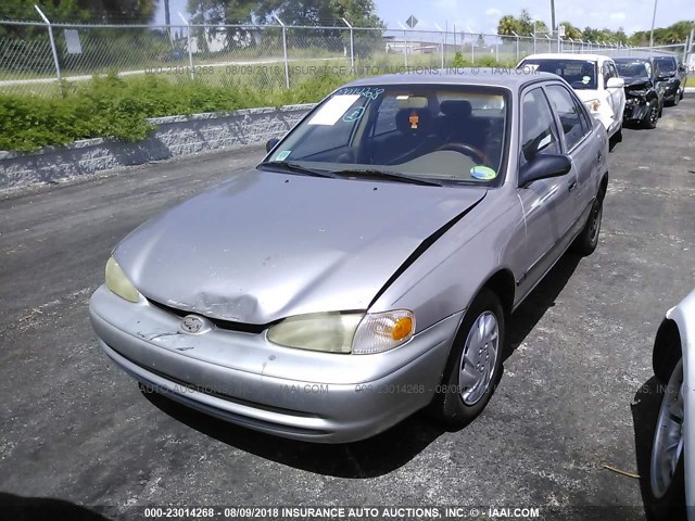 1Y1SK5487XZ444672 - 1999 CHEVROLET GEO PRIZM LSI BEIGE photo 6