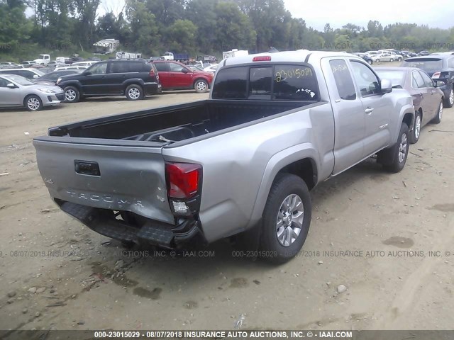 5TFSZ5AN6JX131559 - 2018 TOYOTA TACOMA ACCESS CAB/SR5/TRD SPT/OR SILVER photo 4