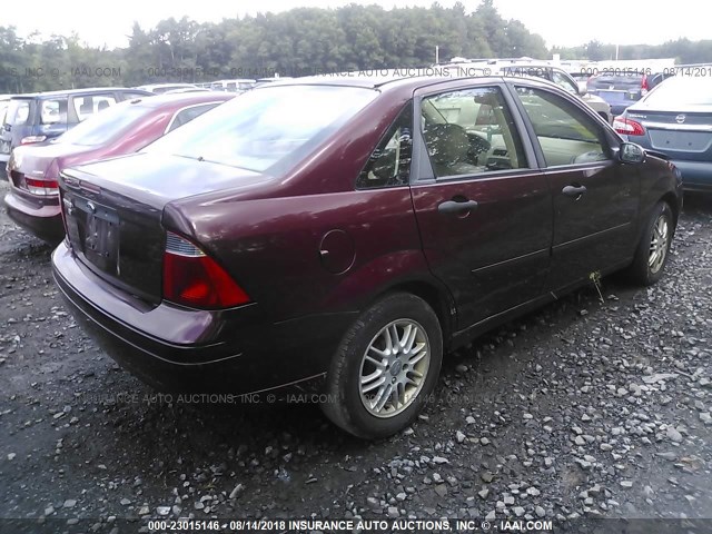 1FAFP34N17W270817 - 2007 FORD FOCUS ZX4/S/SE/SES MAROON photo 4