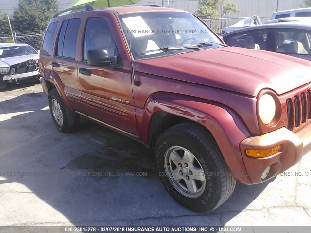 1J4GK58KX2W162031 - 2002 JEEP LIBERTY LIMITED ORANGE photo 1