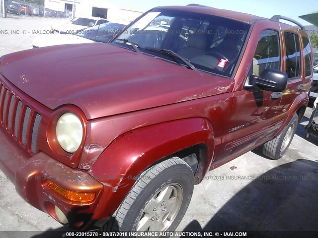 1J4GK58KX2W162031 - 2002 JEEP LIBERTY LIMITED ORANGE photo 2