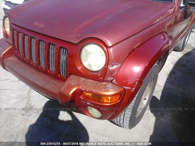 1J4GK58KX2W162031 - 2002 JEEP LIBERTY LIMITED ORANGE photo 6