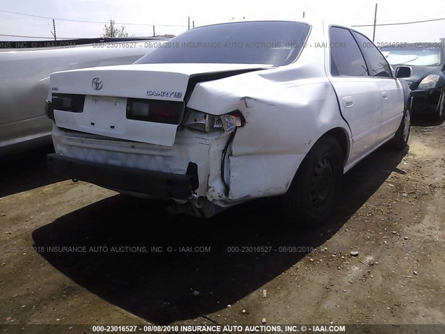 JT2BG22K8X0270949 - 1999 TOYOTA CAMRY LE/XLE WHITE photo 6