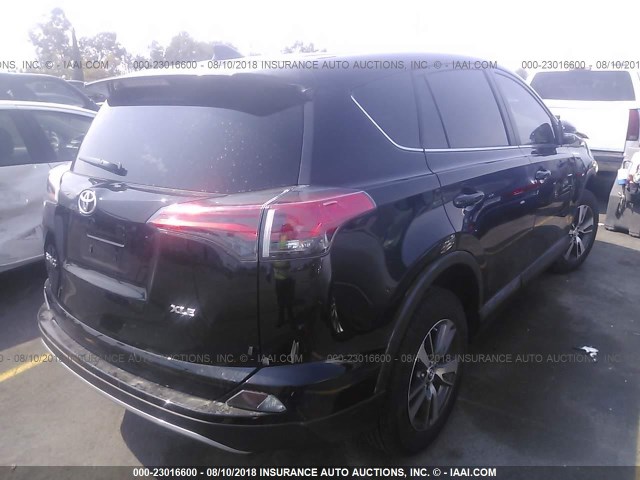 2T3WFREV0JW439245 - 2018 TOYOTA RAV4 ADVENTURE/XLE BLACK photo 4