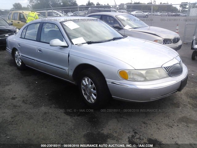 1LNHM97V0XY642853 - 1999 LINCOLN CONTINENTAL  SILVER photo 1