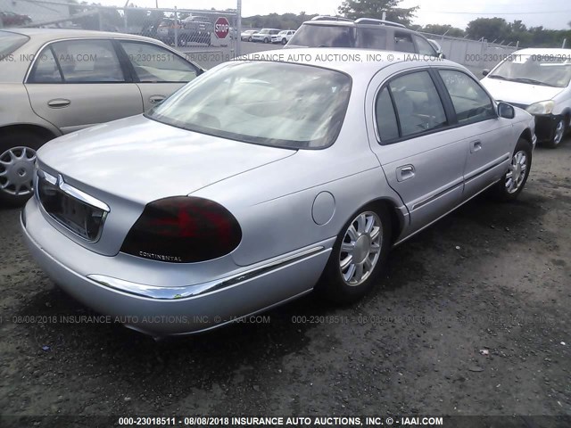 1LNHM97V0XY642853 - 1999 LINCOLN CONTINENTAL  Silber Foto 4