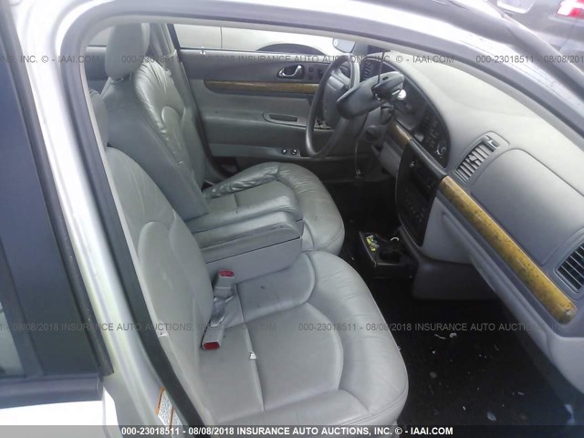 1LNHM97V0XY642853 - 1999 LINCOLN CONTINENTAL  Silber Foto 5