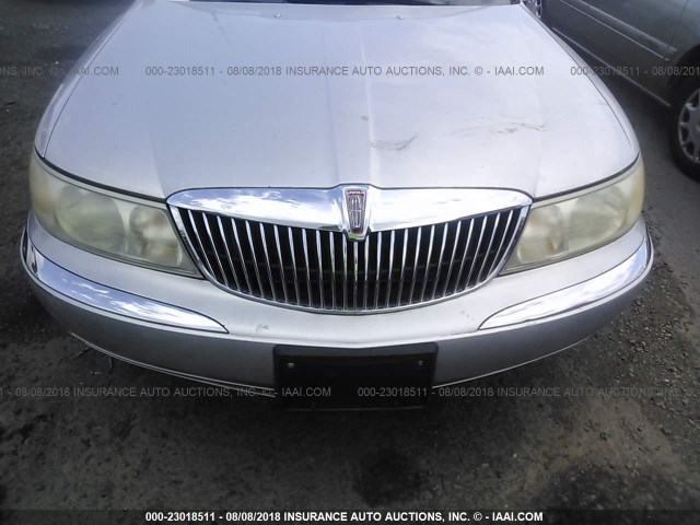 1LNHM97V0XY642853 - 1999 LINCOLN CONTINENTAL  Silber Foto 6