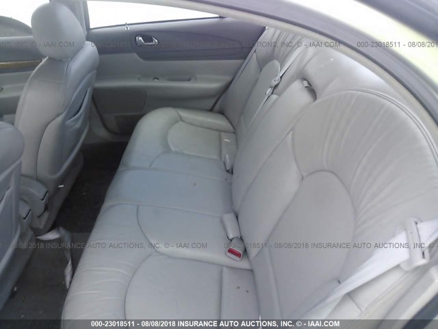1LNHM97V0XY642853 - 1999 LINCOLN CONTINENTAL  Silber Foto 8