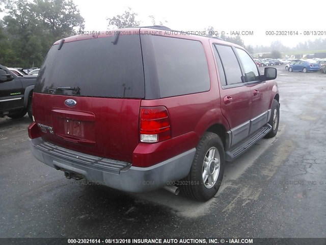 1FMPU16L73LA63069 - 2003 FORD EXPEDITION XLT RED photo 4